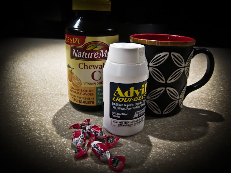 Advil, Vitamin C, Cough drops and tea