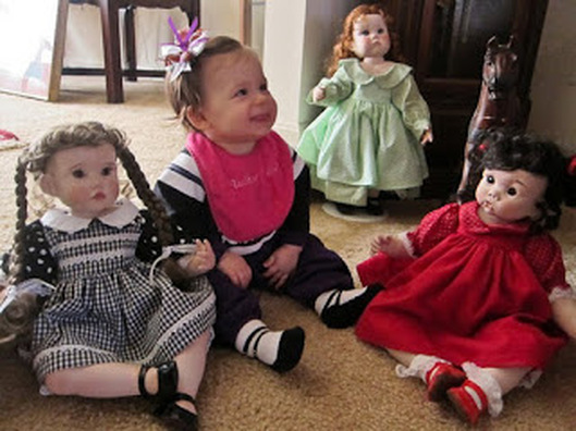 baby with dolls