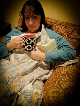 Bobbie sick with tea and tissues