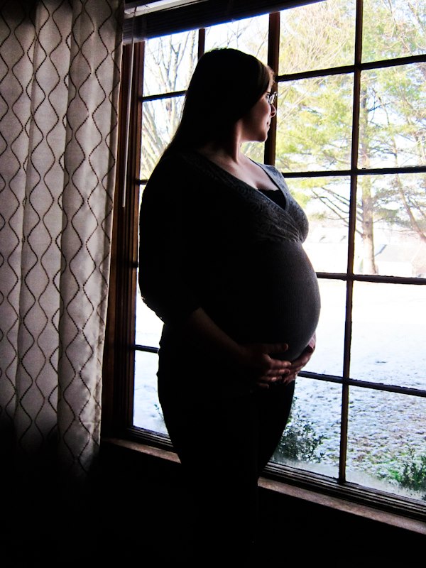 pregnant by the window